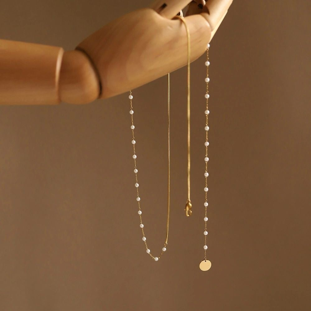 Elegant Soft-Temper Titanium Steel Snake Chain with Shiny Inlaid Beads, Minimal Cold Tone Design